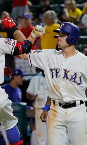 Odor HR pushes Texas past AL wild card-leading Rays 10-9